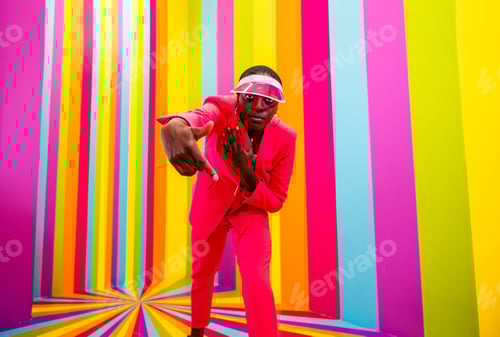 Preview: Beautiful young woman dancing and having fun inside a rainbow box room