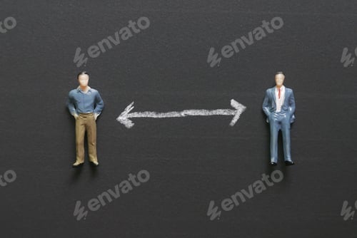 Preview: Top view of miniature people on a chalkboard with white arrow represent social distance of
