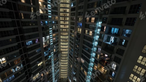 Preview: Window lights in multistorey house at night, Kuala Lumpur