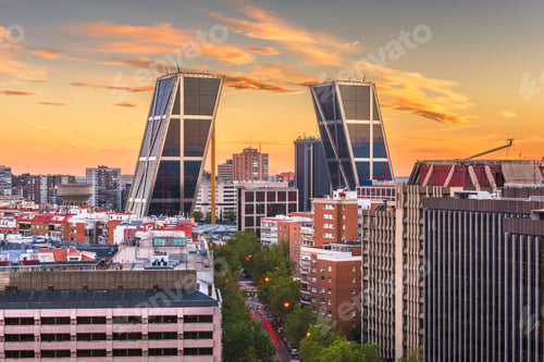Preview: Madrid, Spain financial district skyline at dusk.