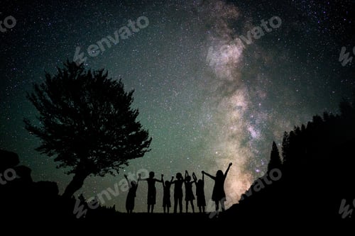Preview: Happy Kids Group Silhouette With Milky Way And Beautiful Night Sky Full Of Stars In Background
