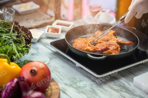 Preview: Hand with fork touching meat