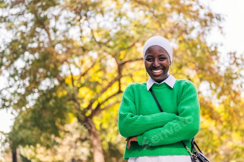 Preview: black woman laughing happy looking at camera