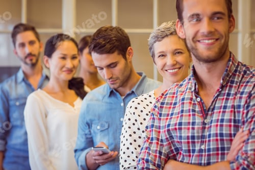Preview: Portrait of a smiling young businesswoman with her team