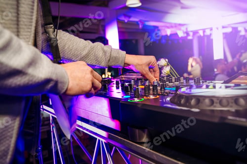 Preview: Dj mixing disco music at night disco club