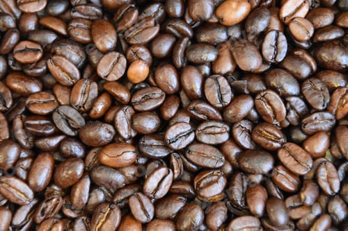 Preview: close up shot of dark brown roasted coffee beans