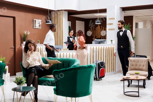 Preview: Guests checking in at modern hotel