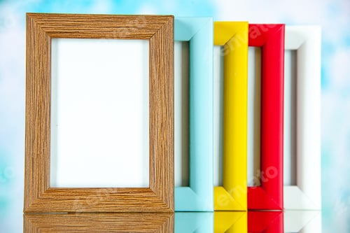 Preview: front view different picture frames with colored corners on light blue background color picture