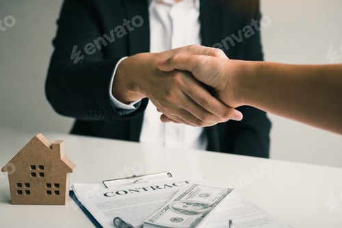 Preview: Home sales agents and buyers work on signing new homes and shaking hands.