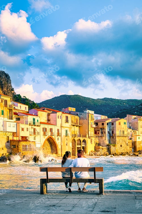 Preview: sunset at the beach of Cefalu Sicily, old town of Cefalu Sicilia panoramic view at colorful village