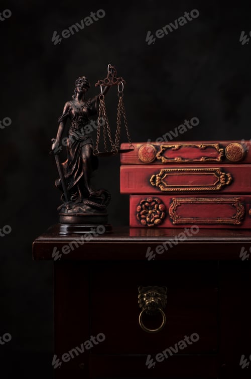 Preview: Legal law concept. Statue Justice on the background old books in the library