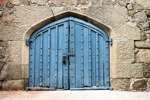 Preview: Old blue door or gate in stone wall
