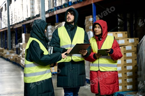Preview: Cold chain logistics team discussing inventory in warehouse