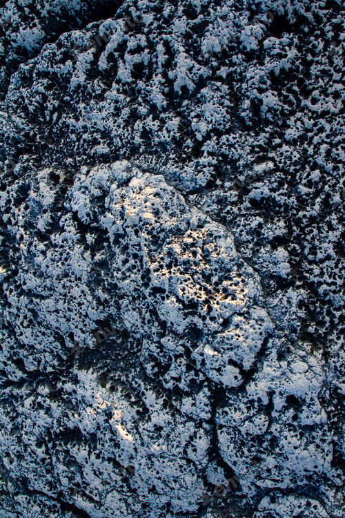 Preview: Vertical shot of a rock texture on the coast of Kamenjak in Istria, Croatia