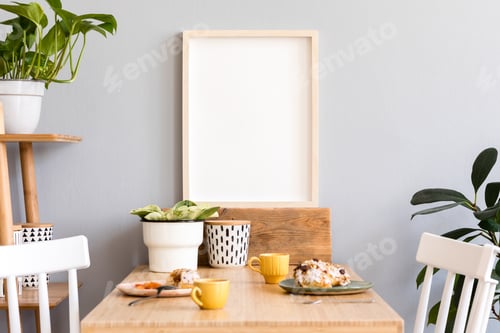 Preview: Stylish interior of kitchen space with wooden table with mock up photo frame.