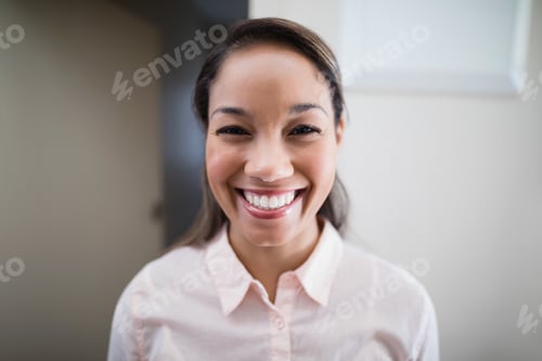 Preview: Portrait of smiling young female physiotherapist