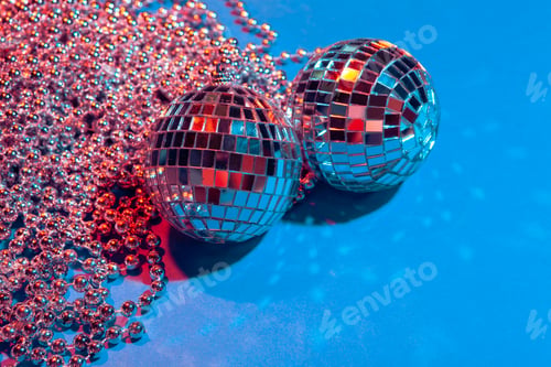 Preview: Mirror party balls put on table close up