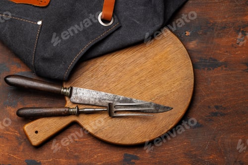 Preview: Meat cooking utensils on wooden table