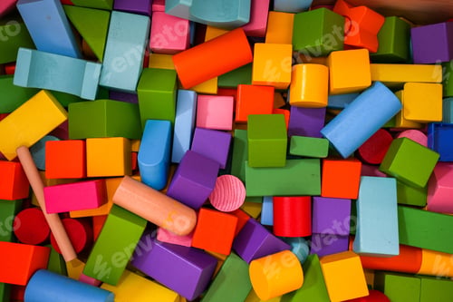 Preview: Background of colorful wooden toy bricks in different shapes.