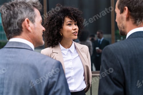 Preview: Business people meeting in a business park