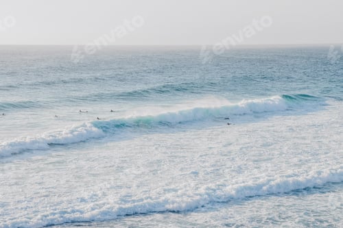 Preview: Waves crushing with surfers in the line up