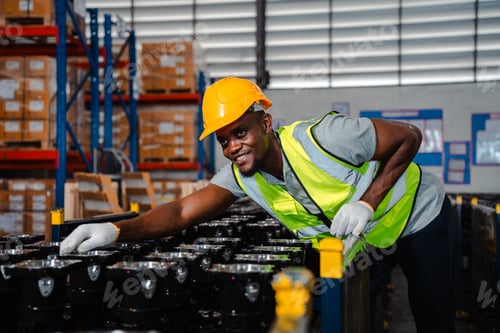 Preview: African American person working to shipping box package by order in logistic warehouse