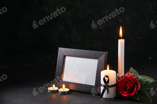 Preview: front view of burning candles with picture frame on dark background funeral evil