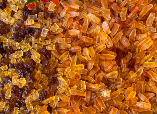 Preview: Delicious jelly bottles. Background from colorful sweets of sugar candies