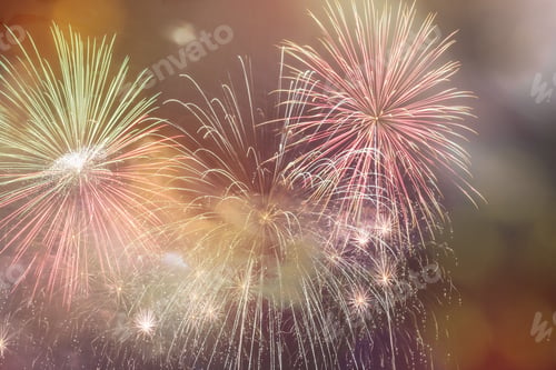 Preview: Colorful firework and bokeh on the night sky, New Year celebration concept with copy space
