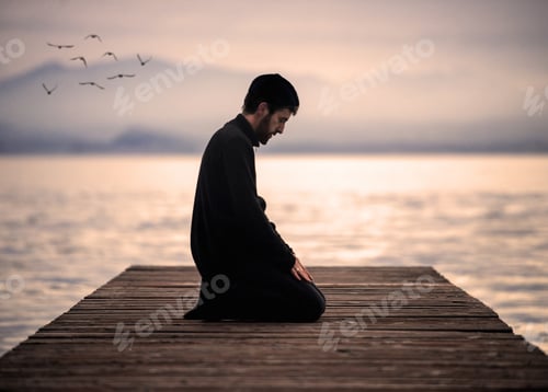Preview: Muslim Man Praying On An Empty Dock