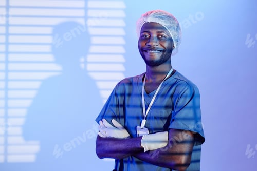 Preview: Male Doctor Smiling at Camera