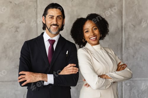 Preview: Cheerful middle eastern man and black woman managers, office interior