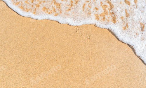 Preview: Sand beach with white foamy on daylight top view seaside in summer season well space for text
