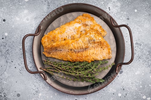 Preview: Fried pollock white fish fillet. grey background. top view