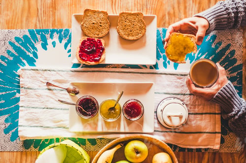 Preview: Top view of table full of food and beverage for breakfast morning time activit - fruit and coffee