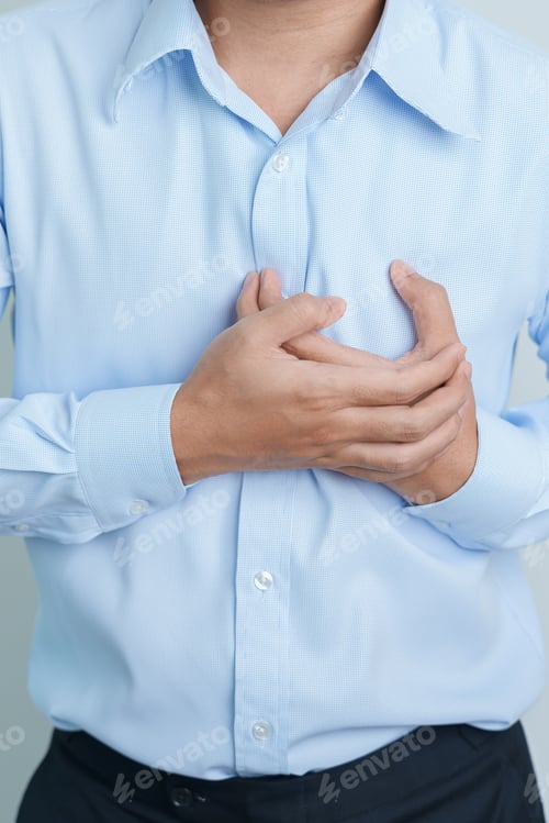 Preview: man hand holding chest ache. Heart disease