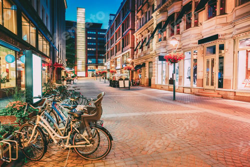 Preview: Helsinki, Finland. Bicycles Parked Near Storefronts In Kluuvikat