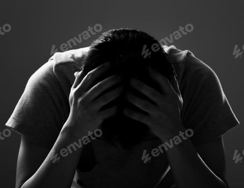 Preview: Sad and depressed man covering face - Feeling depressed background concept