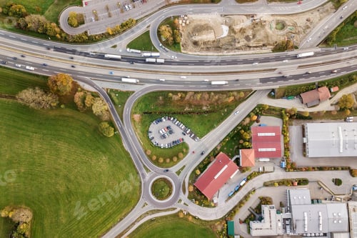 Preview: Top down aerial view of freeway interstate road with moving traffic cars in rural area.