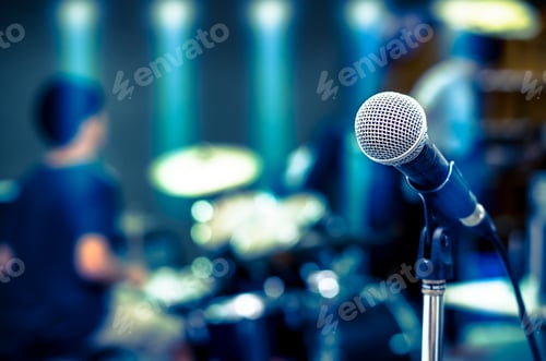 Preview: Close up of microphone on musician blurred background