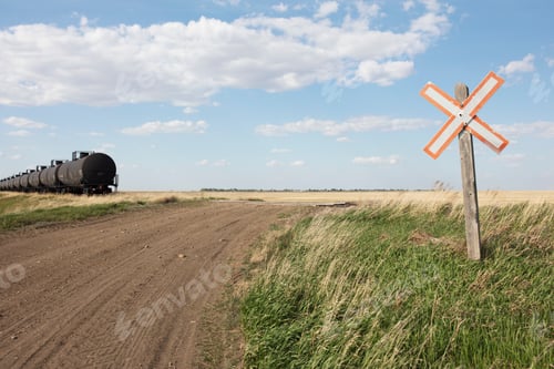 Preview: Oil train cars and road crossing, near Swift Current, Saskatchewan, Canada.