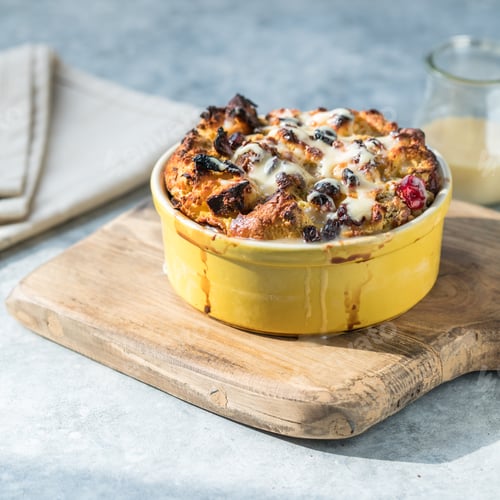 Preview: Bread pudding. Traditional English breakfast casserole with apples and vanilla sauce.