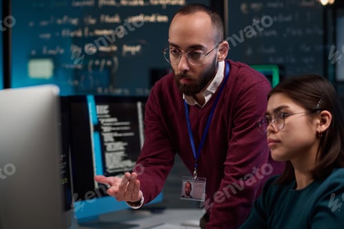 Preview: Bearded Computer Engineer Advising Trainee