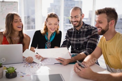 Preview: Business executives discussing over document paper