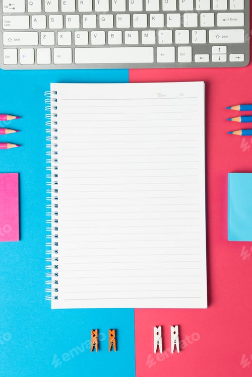 Preview: Vertical composition of notebook with copy space and school equipment on blue and pink surface
