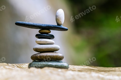 Preview: Balanced Zen stones at the waterfalls