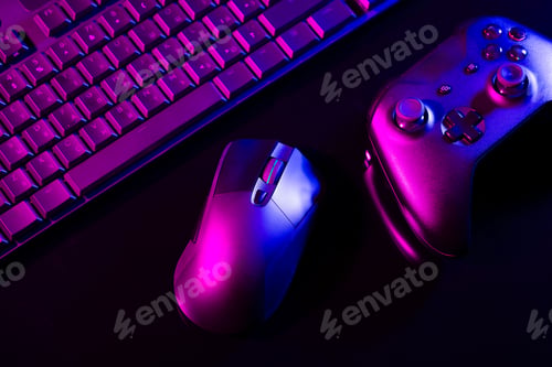 Preview: Computer keyboard, mouse and joystick on black background