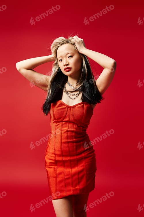 Preview: Vibrant Elegance: Asian Woman Posing in Red Dress