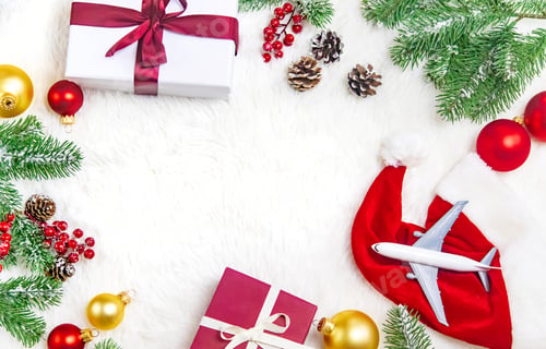Preview: beautiful christmas background with airplane, travel concept. selective focus.