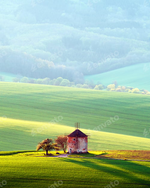 Preview: Picturesque rural landscape with old windmill
